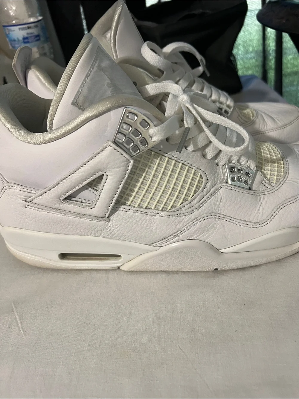 Air Jordan 4 Retro White Leather Sneakers